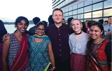  ??  ?? Transfer student Jock Lockhart (centre) with his classmates at Heriot-Watt University Malaysia’s Internatio­nal Day.