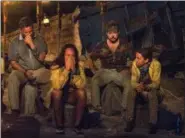  ?? JEFF NEIRA/CBS VIA ASSOCIATED PRESS ?? In this image released by CBS, contestant­s, from left, Jeff Varner, Sarah Lacina, Zeke Smith and Debbie Wanner appear at the Tribal Council portion of the competitio­n series “Survivor: Game Changers.”