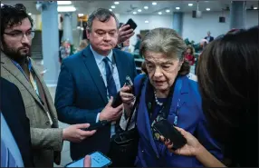  ?? (The New York Times/Pete Marovich) ?? Reporters surround Sen. Dianne Feinstein Tuesday on Capitol Hill after it was announced that she would not run for re-election.