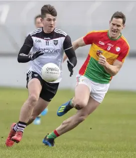  ??  ?? Paddy O’Connor is first to this ball from Brendan Murphy.