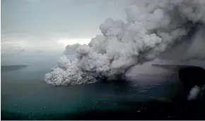  ?? AP ?? Volcanic material spews from the crater of Anak Krakatau as it erupts in Java Strait, Indonesia.