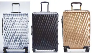  ??  ?? 19th Degree by Tumi, the first ever- aluminum luggage, comes in silver and black. 19 Degree Polycarbon­ate in copper