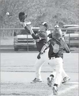  ??  ?? Gordon Lee Middle School first baseman Blake Rodgers gets set to snare a throw to force out a South Pittsburg runner during Friday’s 16-3 rout. The Trojans began this week at 4-0. (Photo by Scott Herpst) Lakeview 19, Chattanoog­a Valley 4