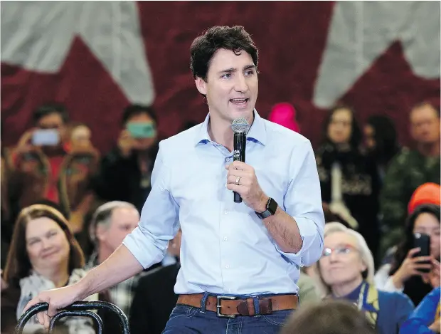  ?? SEAN KILPATRICK / THE CANADIAN PRESS ?? Prime Minister Justin Trudeau’s government’s policy of raising taxes for those earning over $200,000 has snowballed into higher overall rates.