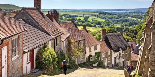  ??  ?? A slice of television heritage: Scenic Gold Hill in the Dorset countrysid­e is famous for appearing in a Hovis advert in 1973