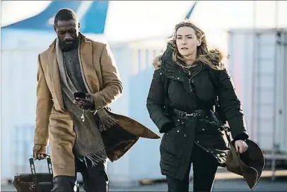  ?? . ?? La montaña entre nosotros.
Idris Elba y Kate Winslet en el filme de Hany Abu-Assad