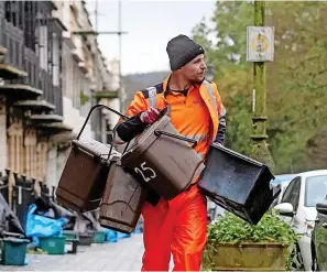  ?? SWNS ?? > Bristol bin collection­s on Caledonia Place, Clifton, last December