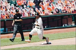  ?? RANDY VAZQUEZ — BAY AREA NEWS GROUP FILE ?? The San Francisco Giants’ Brandon Crawford runs to third base during the fifth inning against the Texas Rangers at Oracle Park in San Francisco on Aug. 2, 2020.