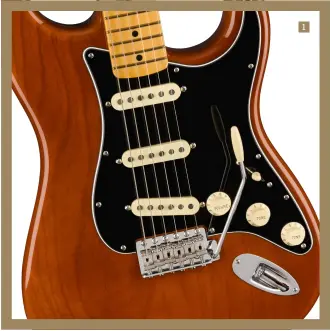  ?? ?? 1. The American Vintage II ’73 Stratocast­er features staggered polepieces and a Mocha finish option, both features indicative of its ‘birth’ year 1