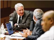  ?? BOB ANDRES / BANDRES@AJC.COM ?? Tex McIver talks to his attorneys during his murder trial Thursday at the Fulton County Courthouse. He’s accused of killing his wife, Diane, in 2016.