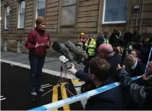  ??  ?? As the true extent of the devastatio­n became clear, Nicola Sturgeon visited the devastated building