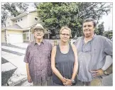  ?? RICARDO
B. BRAZZIELL
/ AMERICAN
STATESMAN ?? Guy Deuel (from left), Tracy Smith and Buddy Bayer, all residents of Garden Street, on Wednesday stand outside of what they say is a party house.