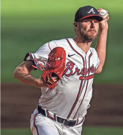  ?? DALE ZANINE/USA TODAY SPORTS ?? Braves starting pitcher Chris Sale pitches against the Padres at Truist Park.