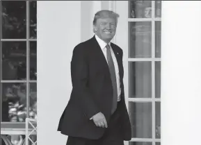  ?? OLIVIER DOULIERY/ABACA PRESS ?? President Donald Trump arrives to make a statement at an event in the Rose Garden of the White House, on Thursday in Washington, D.C.