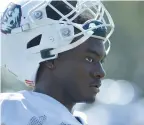  ?? CLOE POISSON/SPECIAL TO THE COURANT ?? Running back Nate Carter takes a break during practice at UConn’s fall football camp in Storrs.