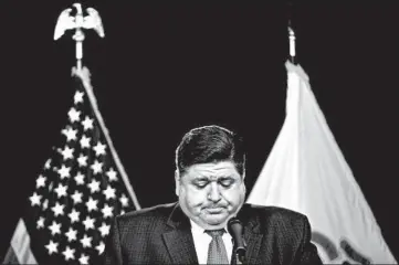  ?? BRIAN CASSELLA/CHICAGO TRIBUNE ?? “Every step that we’ve taken during this crisis, my legal team has understood and laid out our legal authority to do it,” Gov. J.B. Pritzker said. Every day since March 9, he has delivered briefings to the press and the public.