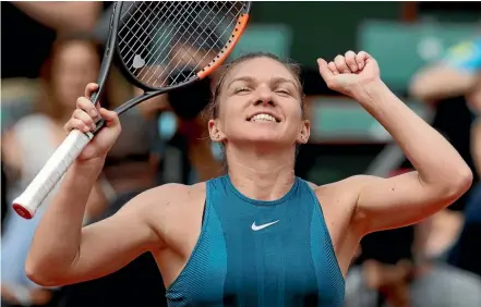  ??  ?? Romania’s Simona Halep came from a set down to beat Angelique Kerber in two hours 14 minutes to advance to the semifinals at the French Open in Paris.