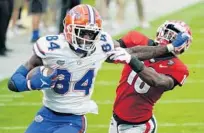  ?? JOHN RAOUX/AP ?? Florida tight end Kyle Pitts set a school record for a tight end with 12 touchdown catches for the 2020 Gators.