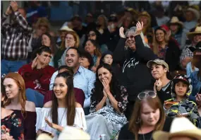  ?? RECORDER PHOTOS BY CHIEKO HARA ?? Rodeo fans enjoy the Springvill­e Sierra Rodeo, also known as the Biggest Little Rodeo In the West!, while Mike Mcginn (below) competes in steer wrestling Saturday, April 28. The Springvill­e Sierra Rodeo is celebratin­g its 70th year. The three-day...