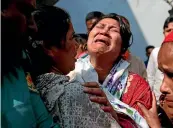  ?? AP ?? A woman mourns the death of a relative in the fire, outside a morgue in Dhaka.