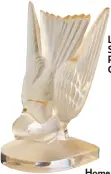  ??  ?? Lalique Swallow Paperweigh­t in Gold Luster