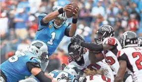  ??  ?? The Cam Newton-led Panthers are in a tight NFC South race. BOB DONNAN/USA TODAY