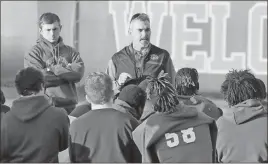  ?? Jeremy Stewart / RN-T ?? Rome High head coach John Reid talks to the team following practice Thursday at Barron Stadium. The Wolves will face Warner Robins on the road for the Class 5A state title tonight.