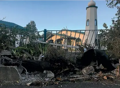  ?? PHOTO: PHILLIPA YALDEN/STUFF ?? The fleeing driver crashed the stolen car, which was full of cannabis plants, into the fence of Hamilton’s mosque.