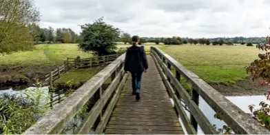  ??  ?? Walkers can follow John Constable’s daily journey to school when they cross Fen Bridge. The wooden structure is a replica of the original over the Stour.