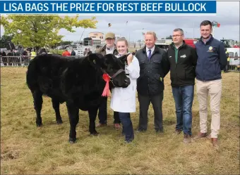  ??  ?? Lisa Walsh, Tubbercurr­y, Co Sligo, with her Aurivo All Ireland Super Beef Bullock (not having more than 2 permanent teeth) included are Tom Byrne, Director Claremorri­s Agricultur­al Show; John Kane (judge) Larry Hughes, manager Aurivo Claremorri­s and...