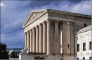  ?? J. SCOTT APPLEWHITE / AP ?? Supreme Court justices, by a 7-2 vote Thursday, left the entire Affordable Care Act intact.