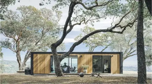  ?? JOE FLETCHER VIA THE ASSOCIATED PRESS ?? New small homes are more elegant, eco-friendly and economical than in the past. Top, a small home in Sonoma, Calif., and above, a 1,750-square-foot residence in Washington state.