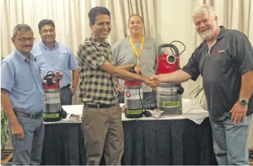  ?? Photo: Pravikash Naidu ?? From right Dewatering business manager Chris Molloy shakes hands with General manager-Clyde Equipment (Pacific) Ltd Praful Dhokai with staff,at Tanoa plaza in Suva on September 26, 2018.