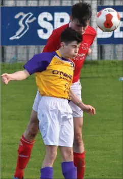  ??  ?? Cillian Gilligan of Wexford puts pressure on Cork’s Ethan Hurley.