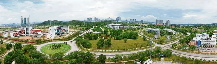  ??  ?? A panoramic view of the EduCity enclave showing (from left) the Sports Complex, Management Developmen­t Institute of Singapore, University of Reading Malaysia Campus, Newcastle University Medicine Malaysia and the Multi-Varsity Complex that contains the...