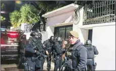  ?? ?? Police break into the Mexican embassy in Quito, Ecuador on April 5. The raid took place hours after the Mexican government granted former Ecuadorian Vice President Jorge Glas political asylum. (AP)