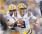  ?? CHUCK COOK/ USA TODAY SPORTS ?? Joe Burrow ran for a TD and threw for one, his 30th this year, against Auburn.