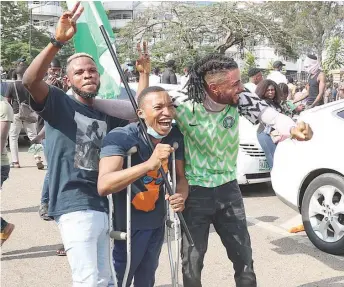  ?? PHOTO: AYODELE ADENIRAN ?? The physically- challenged are not left out in the # ENDSARS protests in Ikeja, Lagos… yesterday.