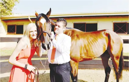  ?? Picture: Tracy Lee Stark ?? HAPPIER TIMES. Former owners Rika and Adriaan van Vuuren pose with Abashiri at the Northrand Training Centre in Midrand last year. It emerged in court yesterday that Van Vuuren has apparently fled the country.