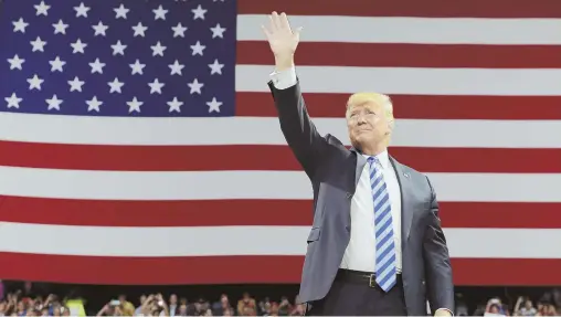  ?? AP PHOTO ?? ON THE TRAIL: President Trump waves as he arrives to speak yesterday at a rally in Charleston, W.Va.