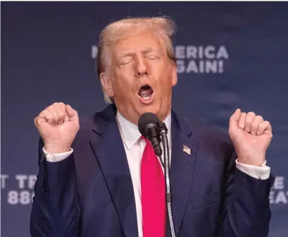  ?? JOSEPH PREZIOSO/AFP VIA GETTY IMAGES ?? Former President and 2024 presidenti­al hopeful Donald Trump speaks Monday in Wolfeboro, N.H.