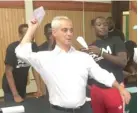  ?? MARK BROWN/ SUN- TIMES ?? Mayor Emanuel mostly watched but took a turn as the paper- plane launcher Friday.
|