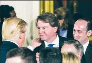  ?? The New York Times/AL DRAGO ?? President Donald Trump congratula­tes Donald McGahn during his swearing in as White House counsel Jan. 22, 2017, at the White House. McGahn disagreed with Trump’s order to fire special counsel Robert Mueller in June and threatened to quit.