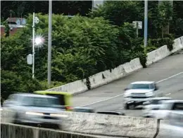  ?? JERRY JACKSON/STAFF ?? A speed camera is triggered on the northbound Jones Falls Expressway in Baltimore. Baltimore Police Commission­er Richard Worley recently said he plans to step up traffic enforcemen­t.