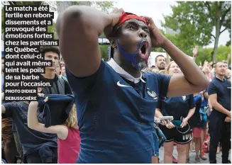  ?? PHOTO DIDIER DEBUSSCHÈR­E ?? Le match a été fertile en rebondisse­ments et a provoqué des émotions fortes chez les partisans de Québec, dont celui-ci, qui avait même teint les poils de sa barbe pour l’occasion.