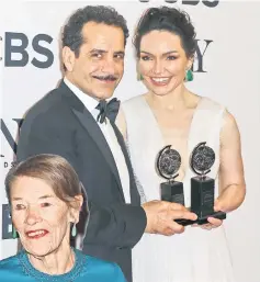  ??  ?? Tony Shalhoub holds his award for Best Performanc­e by an actor in a leading role in a musical and Katrina Lenk her award for Best Performanc­e by an actress in a leading role in a musical award, both for ‘The Band’s Visit’.