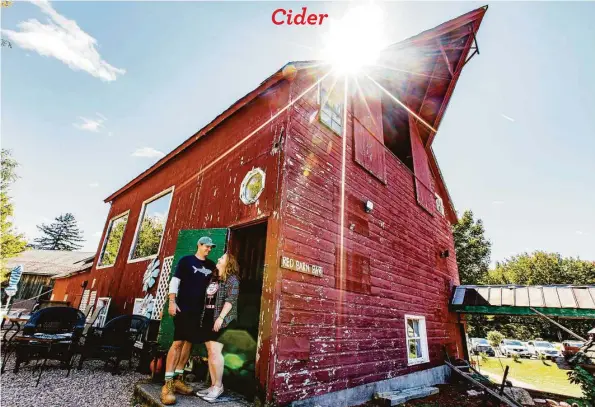  ?? Lisa Nichols / For Hearst Connecticu­t Media ?? Peter and Margaret Borla, Cider Mill manager pictured in front of the Red Barn Bar at Hogan's Cider Mill in Burlington­on Sept. 21. Below, Olivia from Bristol and Alissa from Southingto­n enjoy a hard cider slushie at Hogan's Cider Mill in Burlington on Sept. 21.