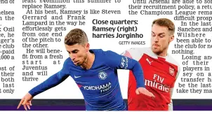  ?? GETTY IMAGES ?? Close quarters: Ramsey (right) harries Jorginho