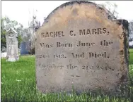  ?? LYNN KUTTER ENTERPRISE-LEADER ?? This is the tombstone for Rachel Marrs, the oldest recorded grave in Prairie Grove Cemetery. She was 5 years old when she died. The historic section of Prairie Grove Cemetery has been nominated for the National Register of Historic Places.