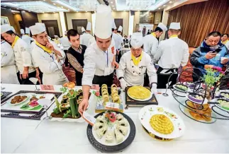  ??  ?? 17 de enero de 2018. Concurso de cocina de la gastronomí­a Lu en Jinan.